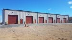 New steel building with oversized garage doors